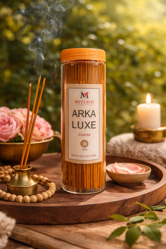 Mittavo Arka Luxe incense stick container on a wooden tray with decorative elements.